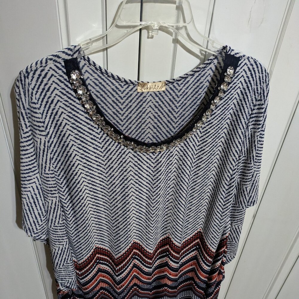 Women's Jeweled neckline blouse.